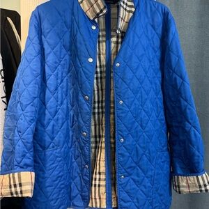 Burberry Blue Quilted Blazer with Plaid Lining in good used condition.Sz Large